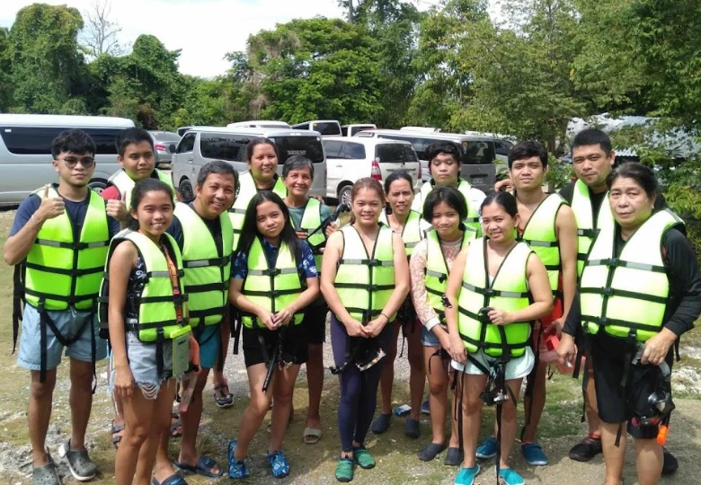 Scenic view of Tumalog Falls cascading into natural pool