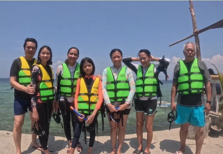 Family taking photos at Temple of Leah Roman-inspired architecture